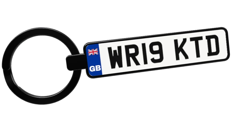 A black keyring with the reg WR19 KTD on a white UK number plate with a GB flag